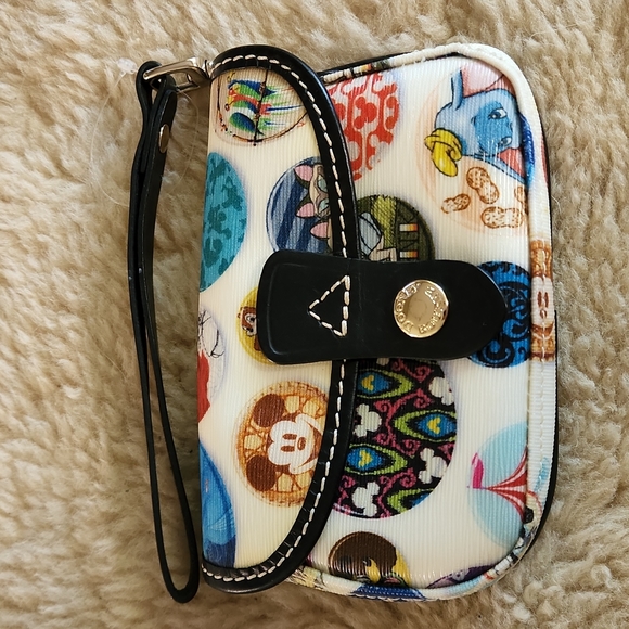 Dooney & Bourke Handbags - NWOT Dooney & Bourke Disney Parks Wristlet 🦜🐘🐁